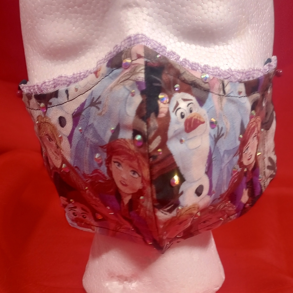 SKU 900KM Frozen Pattern With Studs, Adjustable Earpieces.